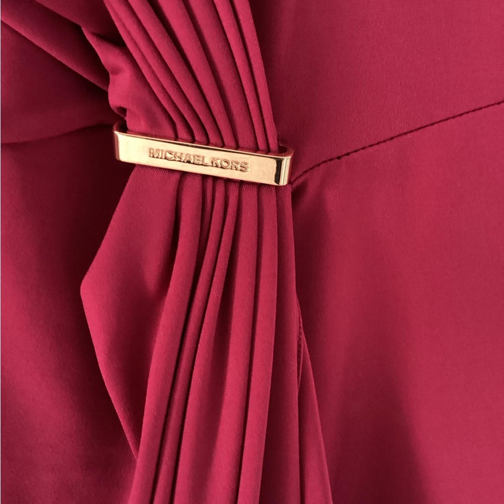 This is actually burgundy not so much pink size large a beautiful dress